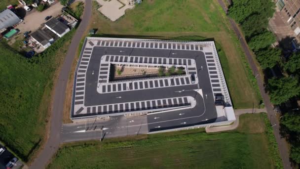 Top Aerial Graphic Outline Parking Lot Arrows Spots Marked Dark — Vídeo de stock