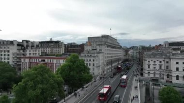 An aerial shot of the traffic Waterloo Bridge on a gloomy day in London, England