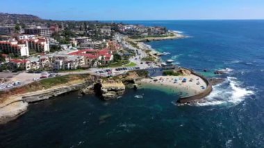 A beautiful slow-motion view of the tide, and people relaxing in La Jolla, California, USA