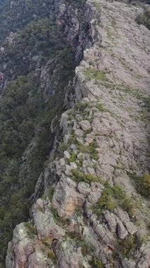 An aerial view of the beautiful cliffs under a blue sky in Australia