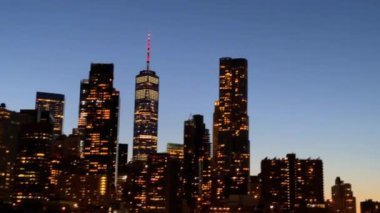 An aerial view of the buildings in a modern city in the evening