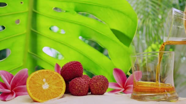 Male Hand Pouring Apple Juice Glass Fruits Flowers Side Outdoors — Stock video