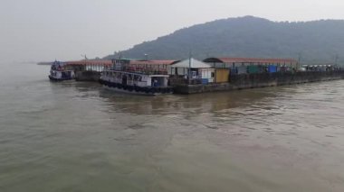 A Reaching the Elephanta Caves passenger boat station by Nautical Vessel ferry boat, Mumbai Portal, India - Elephanta Ferry Station Port