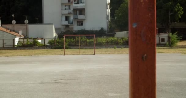 View Old Empty Football Court Buildings Green Trees Croatia — Stockvideo
