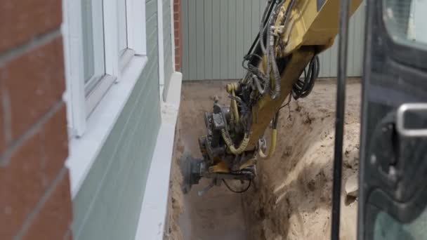 Yellow Excavator Digging Foundation House — Stok video