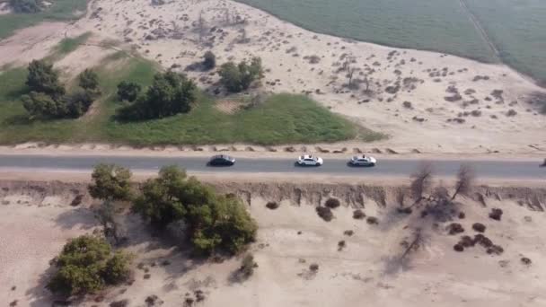 Aerial View Cars Driving Rural Road Cholistan Desert Pakistan — Stock Video
