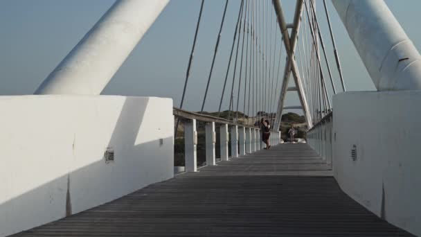 Israeli Woman Riding Bicycle Bridge Sunny Day — Stock video