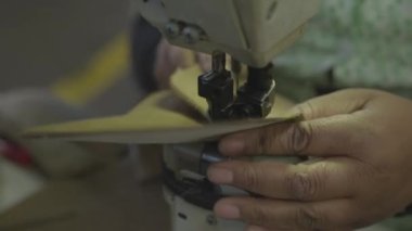 Inside a factory making hanleather shoes