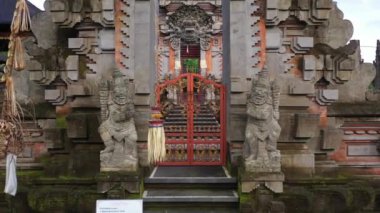 A drone shot of the beautiful design of a temple in Indonesia with a lot of details