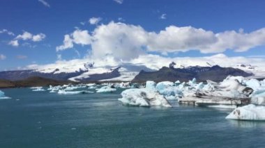 Seafront of the Iceland with pieces of glacier on the beach