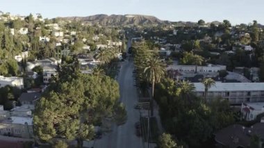 An aerial drone footage of the beautiful Hollywood under the Mount Lee in daytime, LA, California