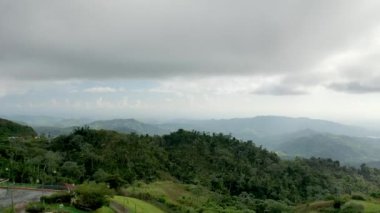 An aerial view of vast mountain landscape seen form a view deck