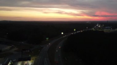 A time-lapse of a beautiful sunset over a busy highway