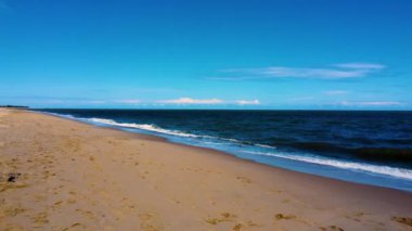 A scenic view of the sea waves on the Caister-on-Sea, England
