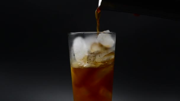 Refreshing Tropical Cocktail Drink Poured Glass Ice Black Background — Stok video
