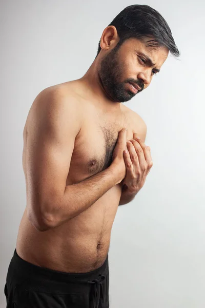 Studio Portrait Young Indian Man Suffering Heart Burn Chest Inflammation — Stock Photo, Image