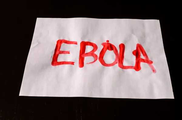 Слово Эбола Текст Написанный Кровью Белой Бумаге — стоковое фото