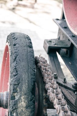 A closeup shot of the old farm machinery on the road