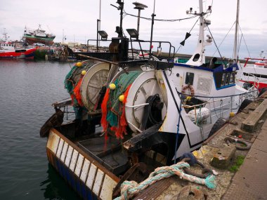 A beautiful photo of a fishing boat at the pier in Brittany, in the north-west of France