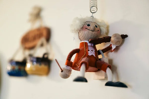 Closeup Wooden Mozart Figurine Hung White Wall Home — Stockfoto