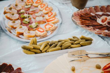 A catering buffet table with snacks