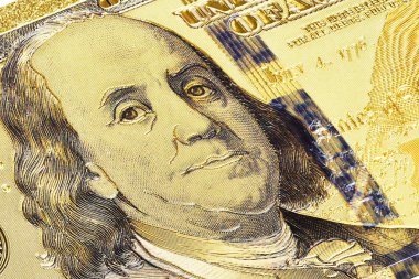Benjamin Franklin 'in Amerikan doları banknotundaki yakın çekimi.