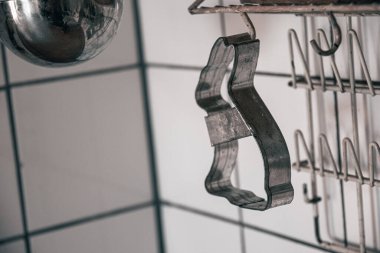 A closeup shot of a hanging rabbit shape cookie cutter