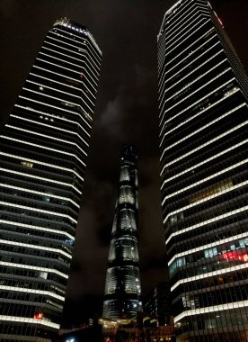 A low angle shot of buildings at night