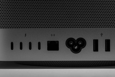 Thunderbolt, Ethernet, Power connection low key still life of new desktop computer system