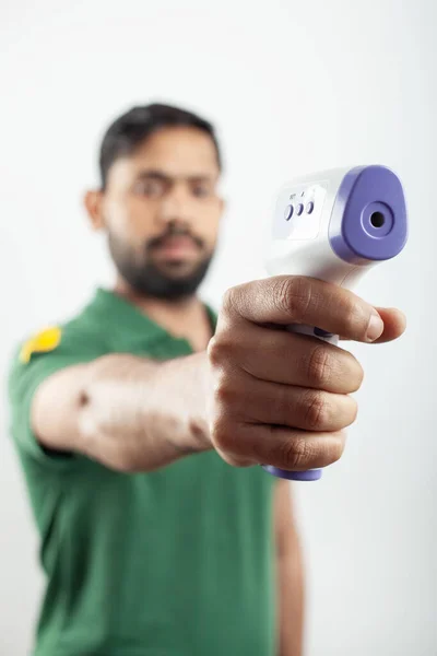 One Male Holding Infrared Digital Thermometer Measuring Corona Flu Body — Stok fotoğraf