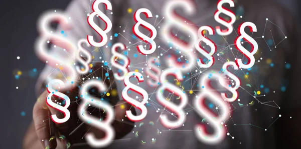 Bir elin yakınındaki illüstrasyonlu Yasaları Koruma Sembolleri 'nin yakın çekimi