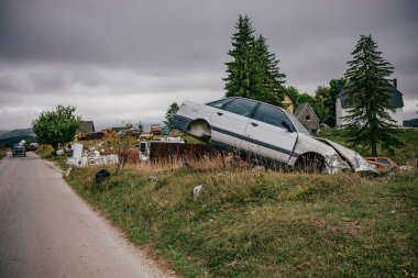 The car scrapyard on the roadside in Montenegro.