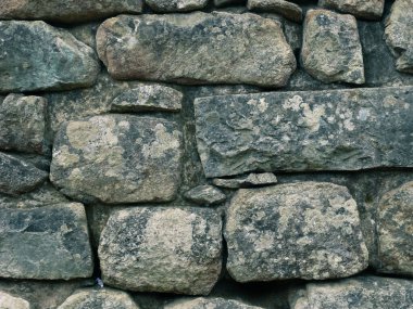 A close-up of a house brick wall in Machu Picchu, Peru