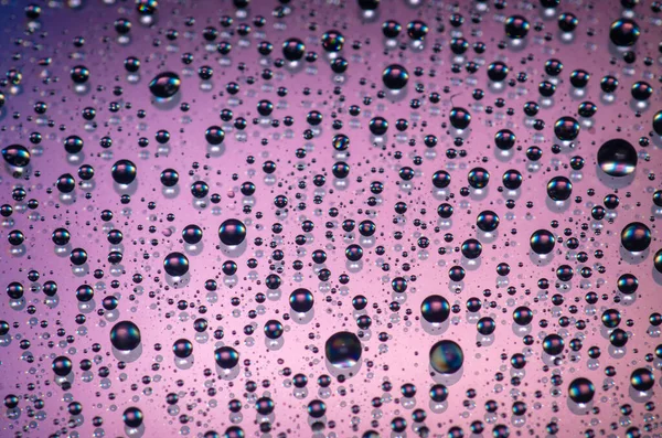 Macro Shot Water Droplets Purple Surface — Fotografia de Stock