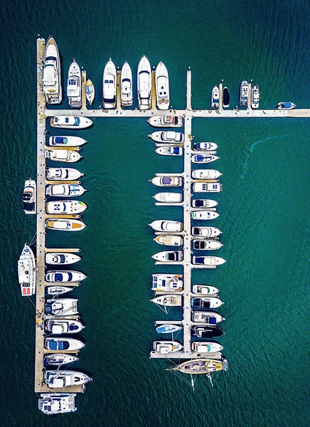 A bird\'s eye view of boats moored at a marina