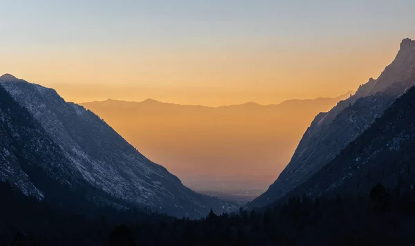 A beautiful landscape view of an epic mountain sunset above the Salt Lake City Utah, United States