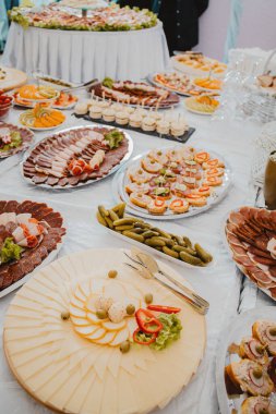 A catering buffet table with snacks