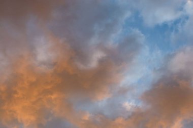 looking up at dramatic color sky and morning cloud