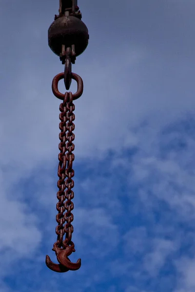 Chains Hooks Hanging Crane Cloudy Sky — Fotografia de Stock