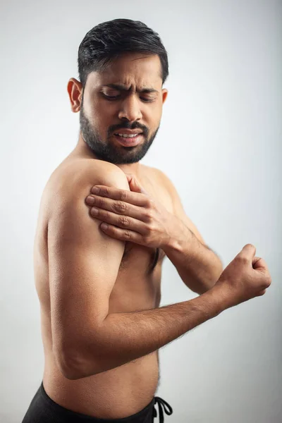 Young Caucasian Man Clutching Shoulder Deltoids Injury Pain White Background — Stock Photo, Image