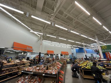 Grovetown, Ga USA - 11 24 21: Walmart Thanksgiving shoppers produce and people shopping