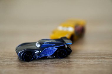 A selective focus shot of Mattel Jackson Storm character toy race car from the Disney Pixar Cars movie