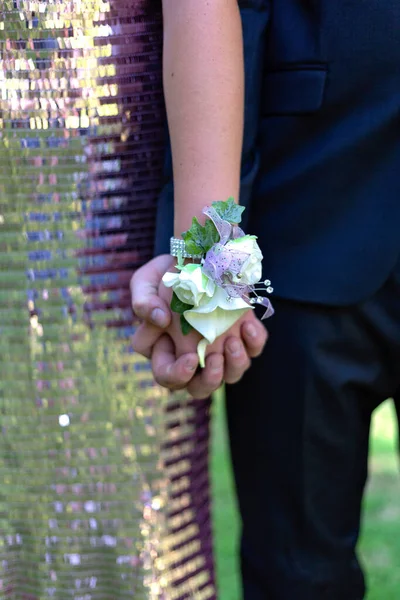Closeup Shot Young Couple Holding Hands Flower Wrist Corsage Prom — Stock Photo, Image