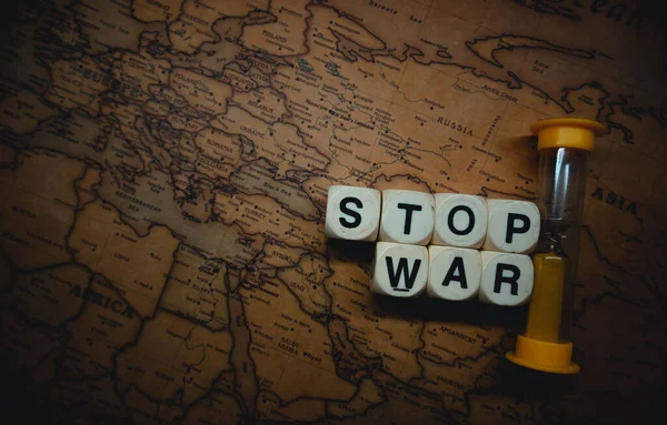 Closeup Hourglass Cube Words Stop War Placed Russia Ukraine World — Fotografia de Stock