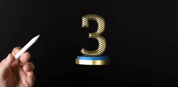 台座の記念日と賞の概念上の3Dレンダリング黄金3を指すペンを持つ男の手 — ストック写真