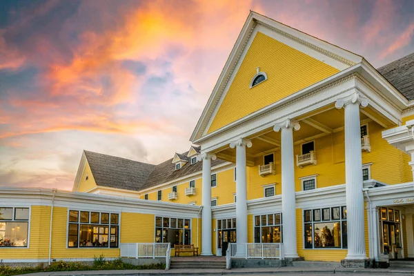 The beautiful exterior of a hotel in Yellow Stone during a scenic sunset