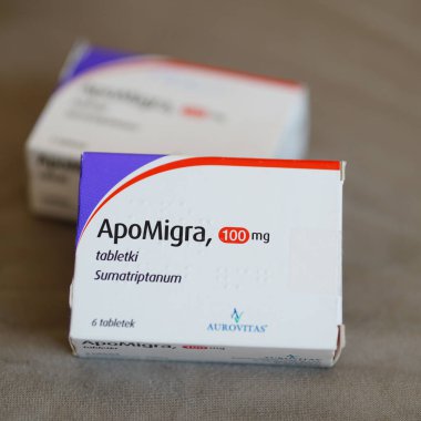 A closeup of ApoMigra brand pills against migraine in boxes