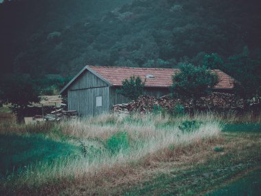 A small rural house in a valley