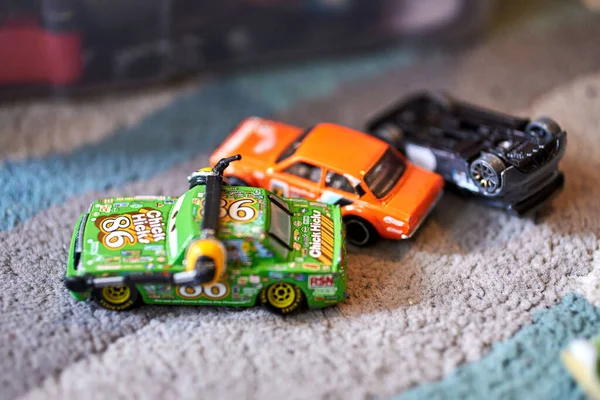 A selective focus of Mattel Hot Wheels colorful car toys