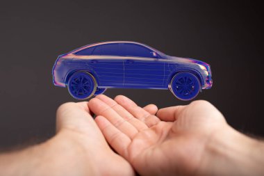 3D sunan bir adam otonom elektrikli araba üretiyor.